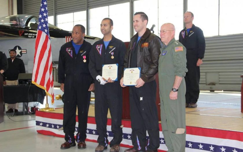 Lt. Sean Noronha, second from the left, and Jason Hirzel, third from the left, are awarded Air Medals